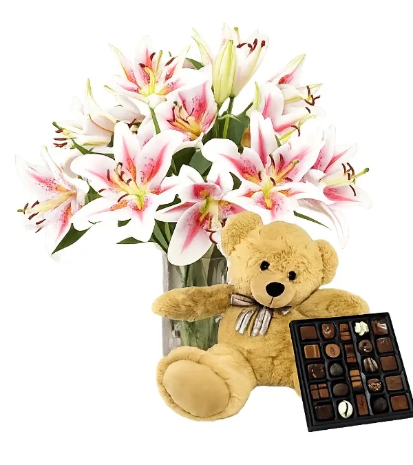 Product Pink lilies with a large teddy bear and chocolates Image