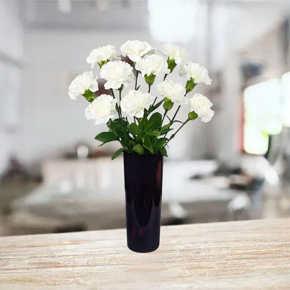 11 white carnations